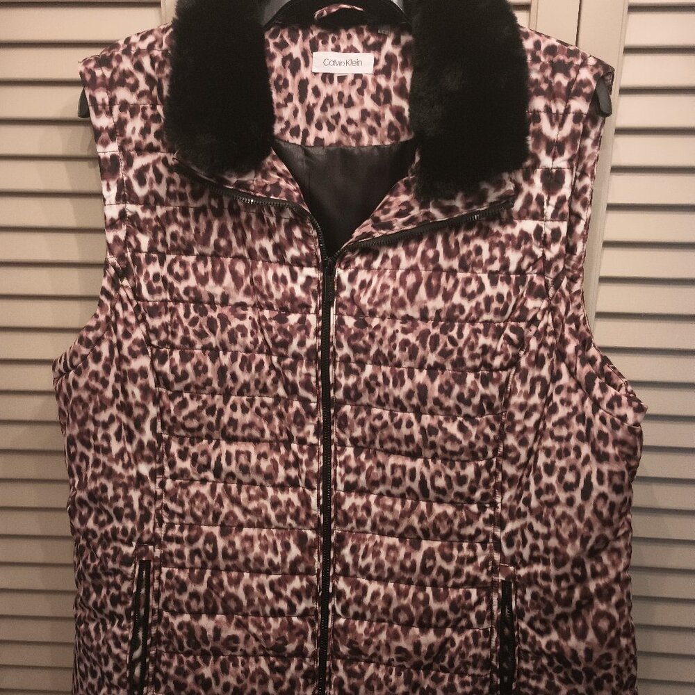Calvin Klein Cheetah print puffer vest.